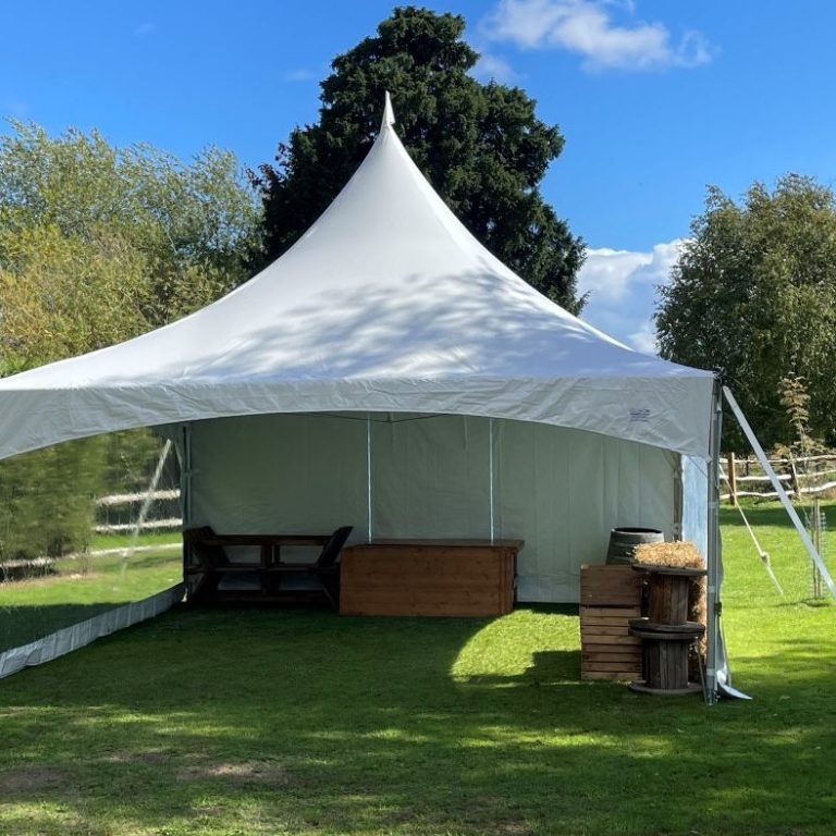 Twilight Marquee Marquee with sides open on a warm evening